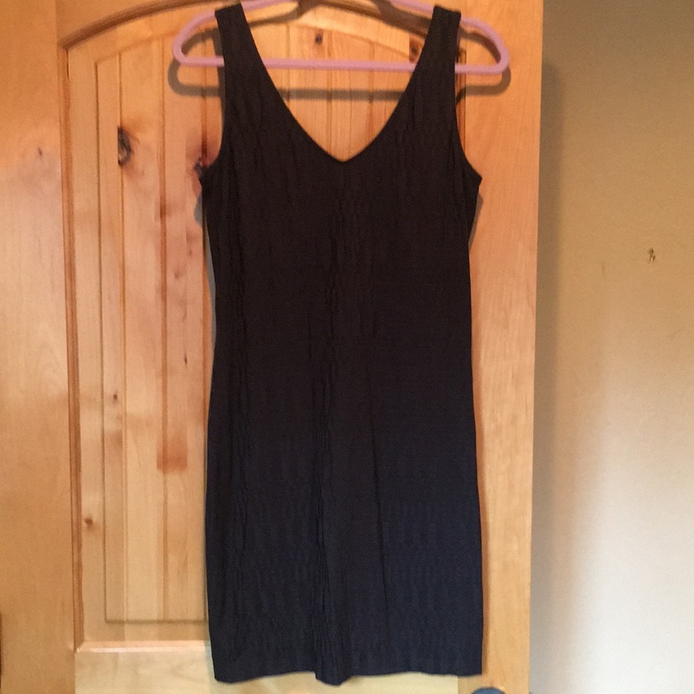 Stretchy black dress.